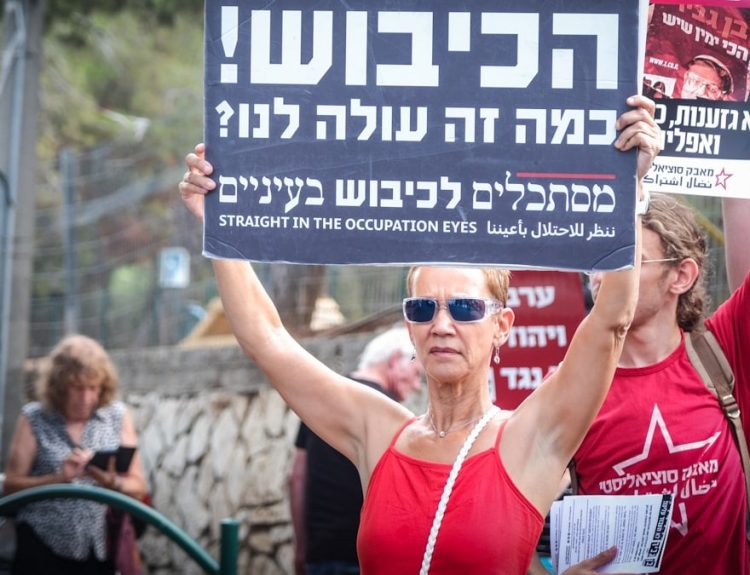 a person holding a sign